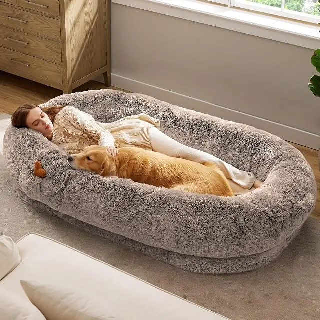 Bedsure Human Dog Bed, a 71-inch faux fur nest bed with a bolster